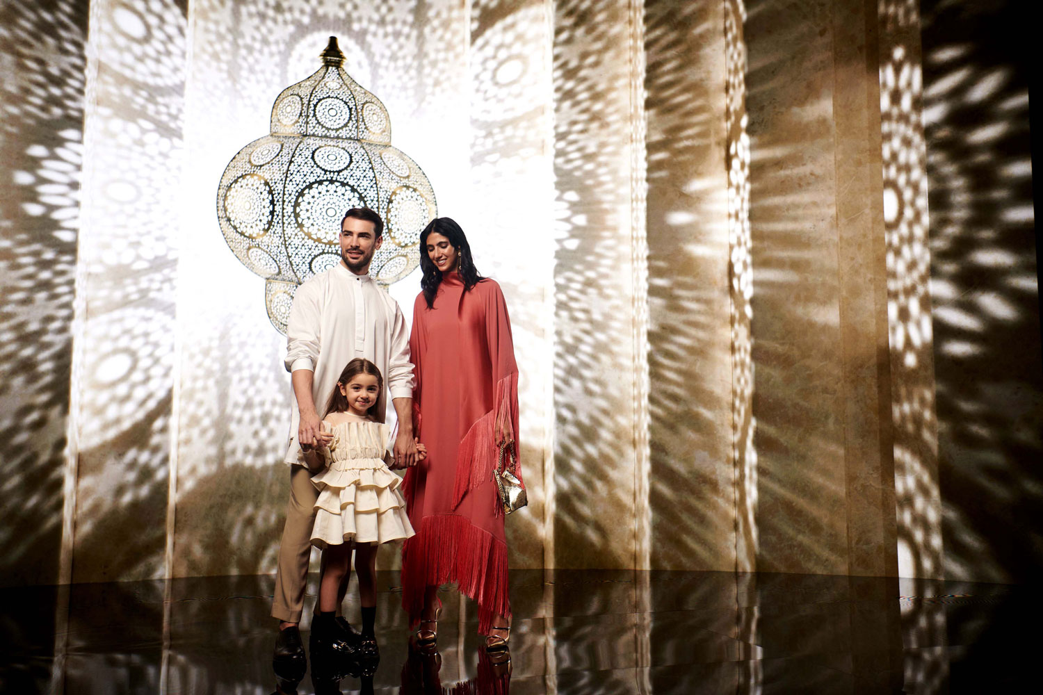 Parents with daughter enjoying Ramadan in Abu Dhabi shopping mall