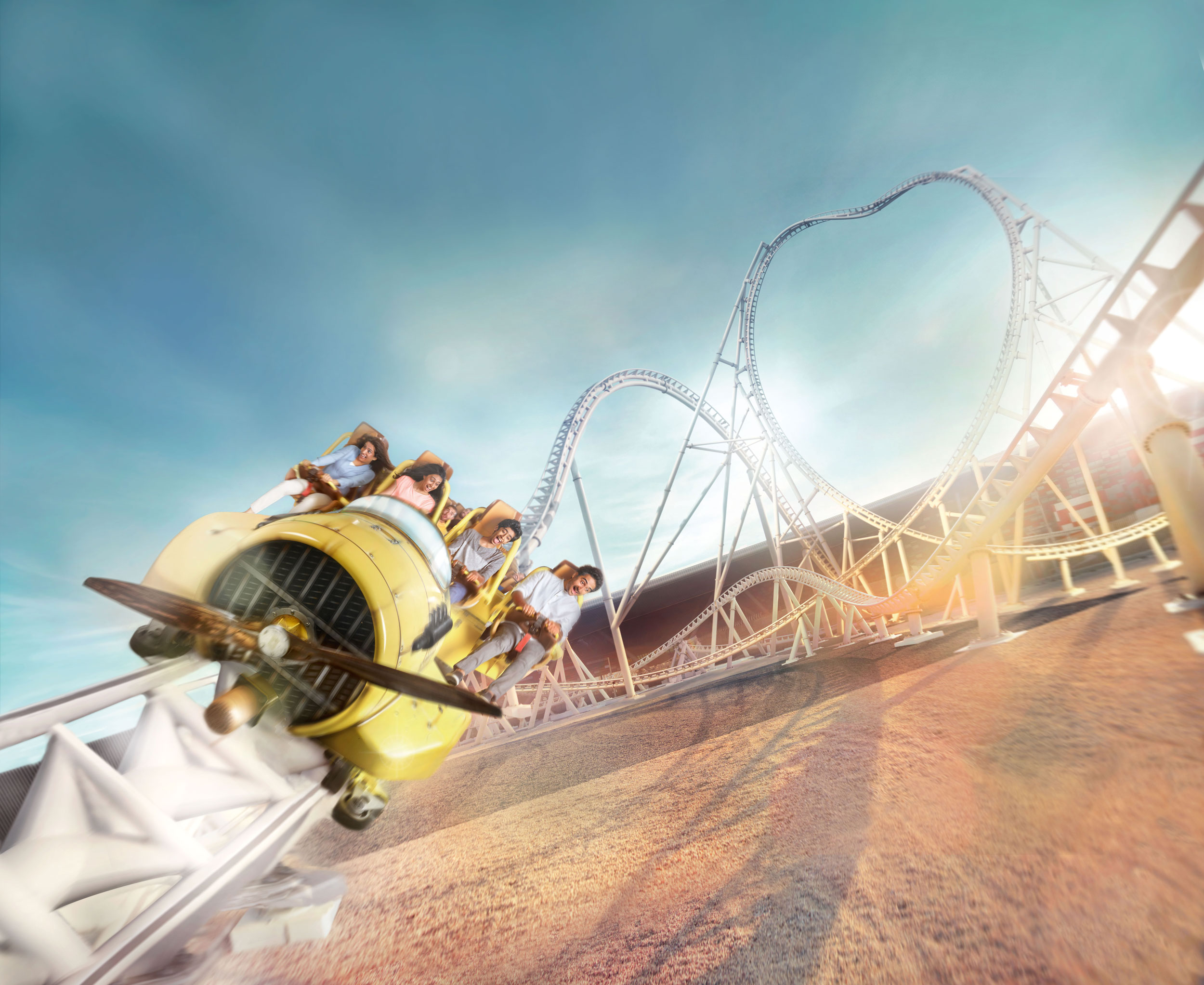 People enjoying the thrilling Flying Aces rollercoaster in Abu Dhabi