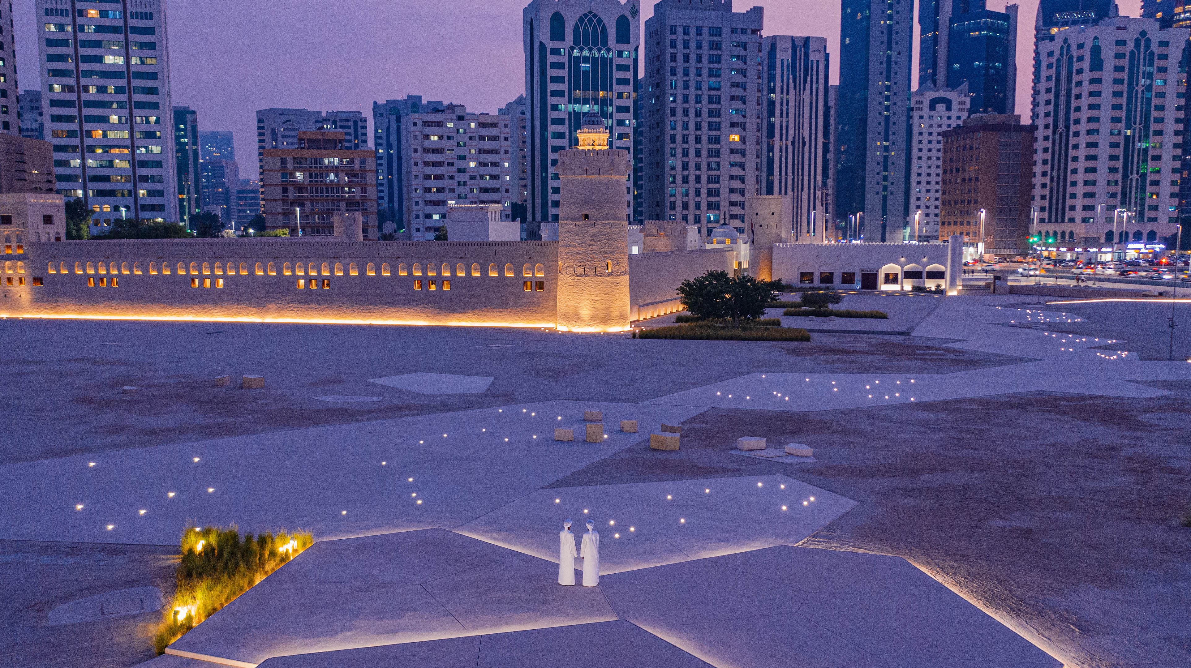 View of Qasr Al Hosn from across the waters, with the Abu Dhabi skyline behind it